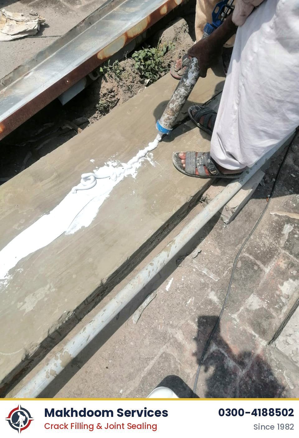 Post monsoon roof leak quick repair Lahore: sealant going into a crack